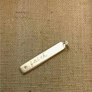 Stella and Dot Faith charm in sterling silver